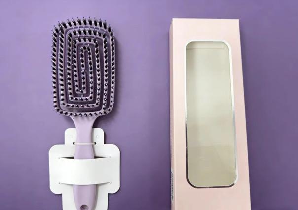 Boar Bristle Brush designed for hair smoothing, shining, and detangling, featured next to its packaging.