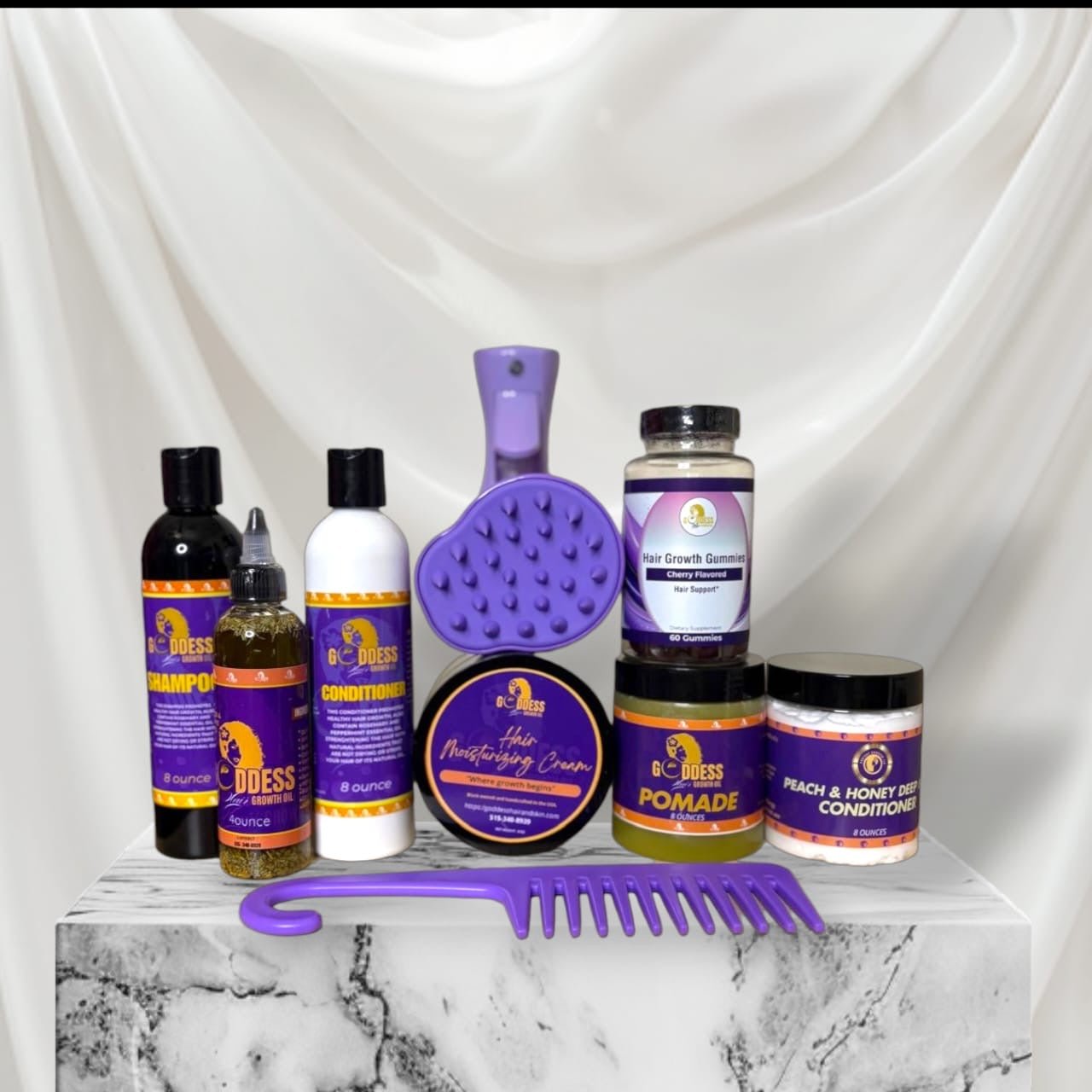 Hair Growth Kit featuring shampoo, conditioner, pomade, growth gummies, and a comb on a marble surface.